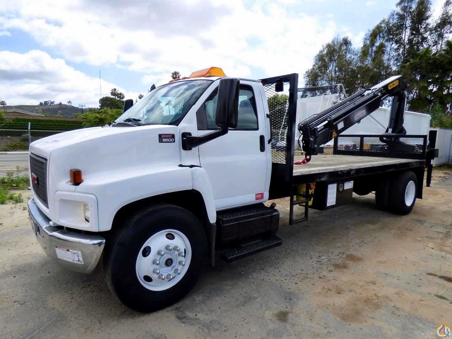 Used Palfinger PK 11502 B knuckle boom mounted to 2004 GMC C6500