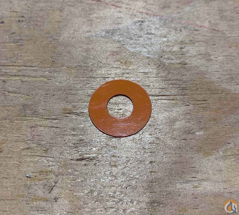 SHIM .030 1-1/4X17/32 ID CORAL PLAS