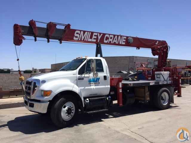Non - CDL Truck with the REVOLUTION 84RM crane that will reach 84' and it's rear mounted.