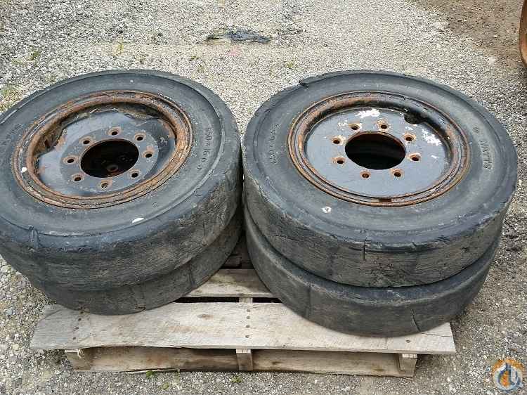 Solid skid steer tires and rims