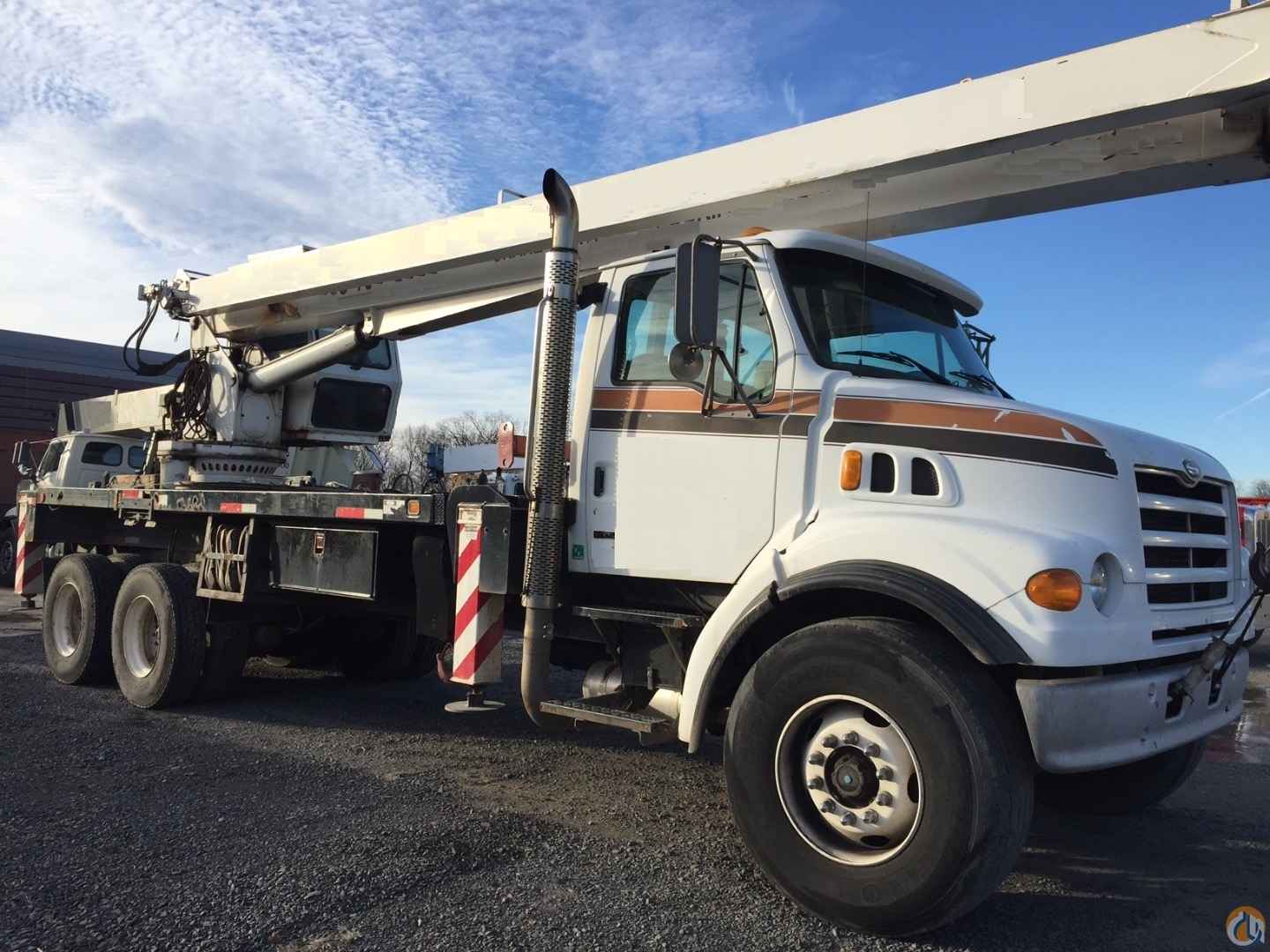 Used Manitex 22101 S Tandem rear mount crane mounted to 2000 Sterling LT7500 chassis