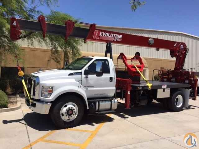 Non - CDL Truck with the REVOLUTION 84RM crane that will reach 84' and is rear mounted.