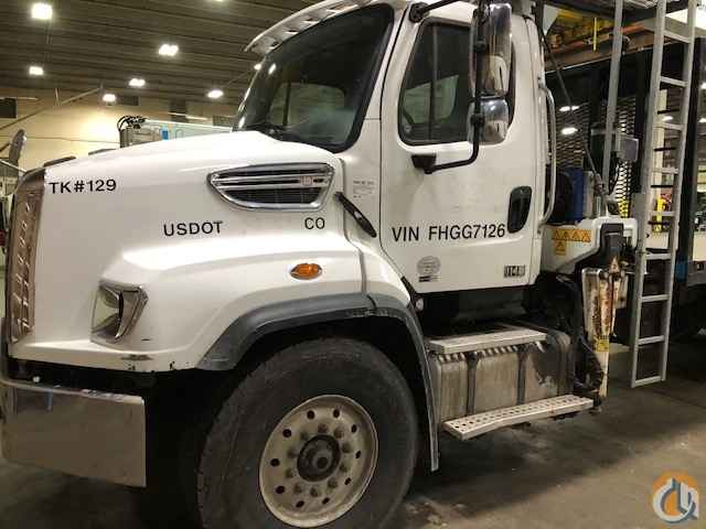 Used Cormach WB65 wallboard crane installed on 2015 Freightliner 114SD chassis