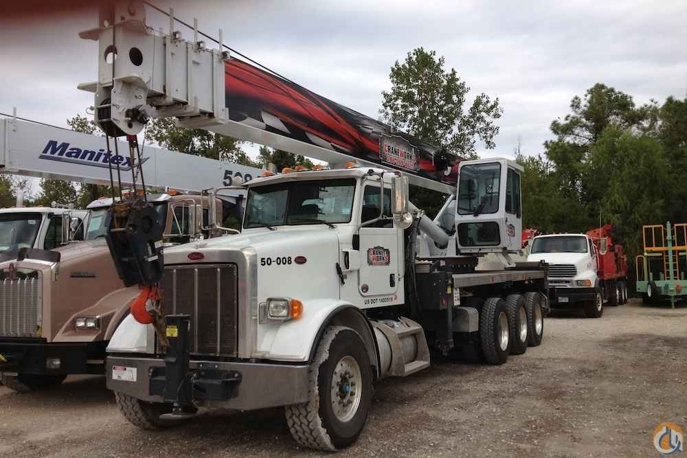 Used Manitex 5096S boom truck mounted to 2011 Peterbilt 367 tri-drive chassis