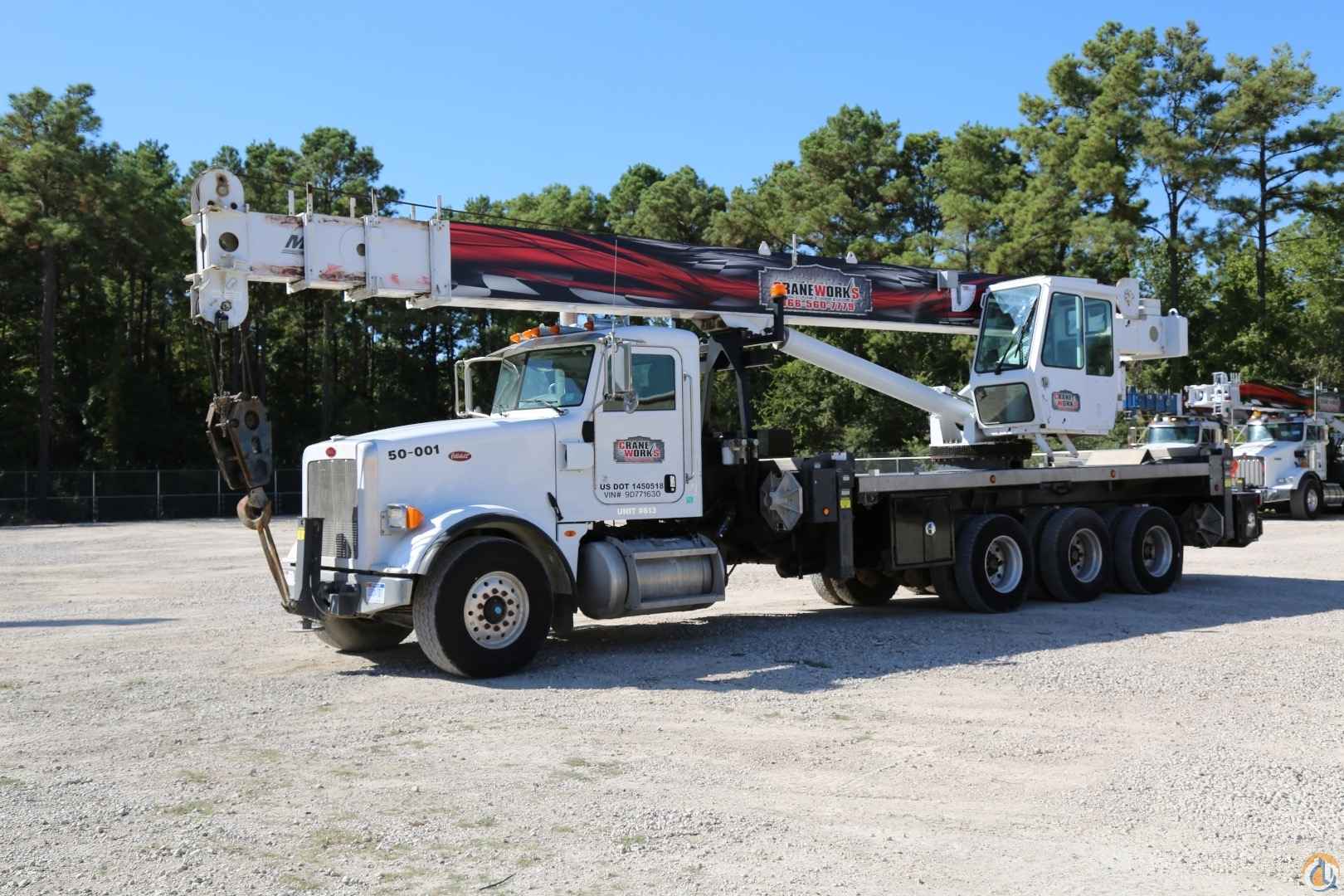 2009 Manitex TC5096S boom truck mounted to 2009 Peterbilt 367 tri-drive chassis