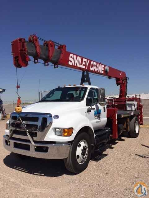 REVOLUTION 84RM crane with a reach of 84' -rear mounted. No CDL Required